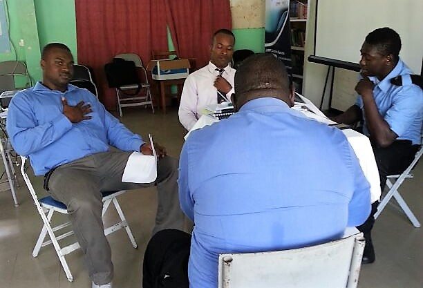 Officers engage in role play.