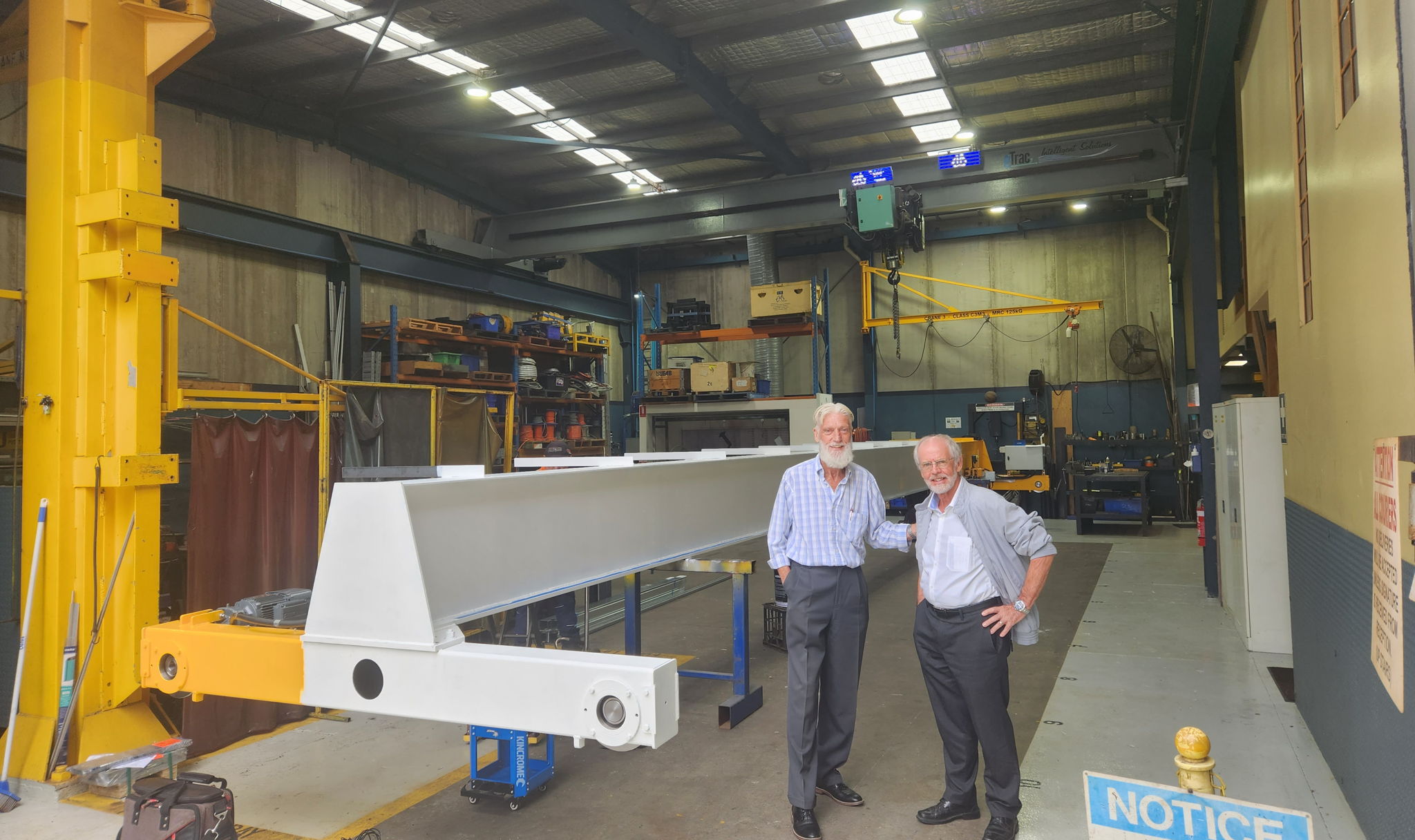 On the left: Brian Williams, owner of EMS. On the right: Joergen Moeller, Jebsen & Jessen Group together in the EMS facility in Sydney, Australia.