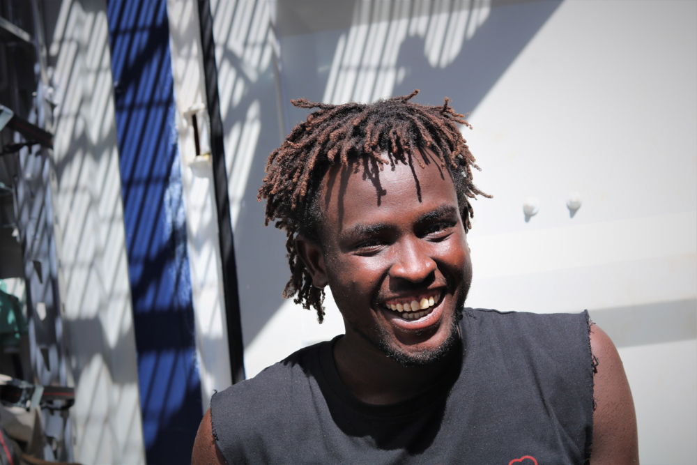 Bob is 19 years old, from Sudan. Bob is his nickname because he looks like Bob Marley. Which is ironic, because he doesn’t even like Bob Marley, even though he is growing his hair long like him. 

Bob's favourite song is “See you again” by Kalifa, he loves KFC and his favourite colour is red. 

He has five brothers and two sisters. They don’t know where he is right now. 

He had been at sea for four days before being rescued by Ocean Viking.
Copyright: Hannah Wallace Bowman/MSF