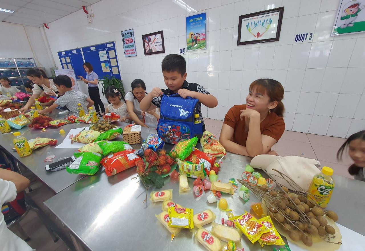 Party taking place in the company canteen at the Jebsen & Jessen Packaging Factory in Bac Ninh, Vietnam Party taking place in the company canteen at the Jebsen & Jessen Packaging Factory in Bac Ninh, Vietnam