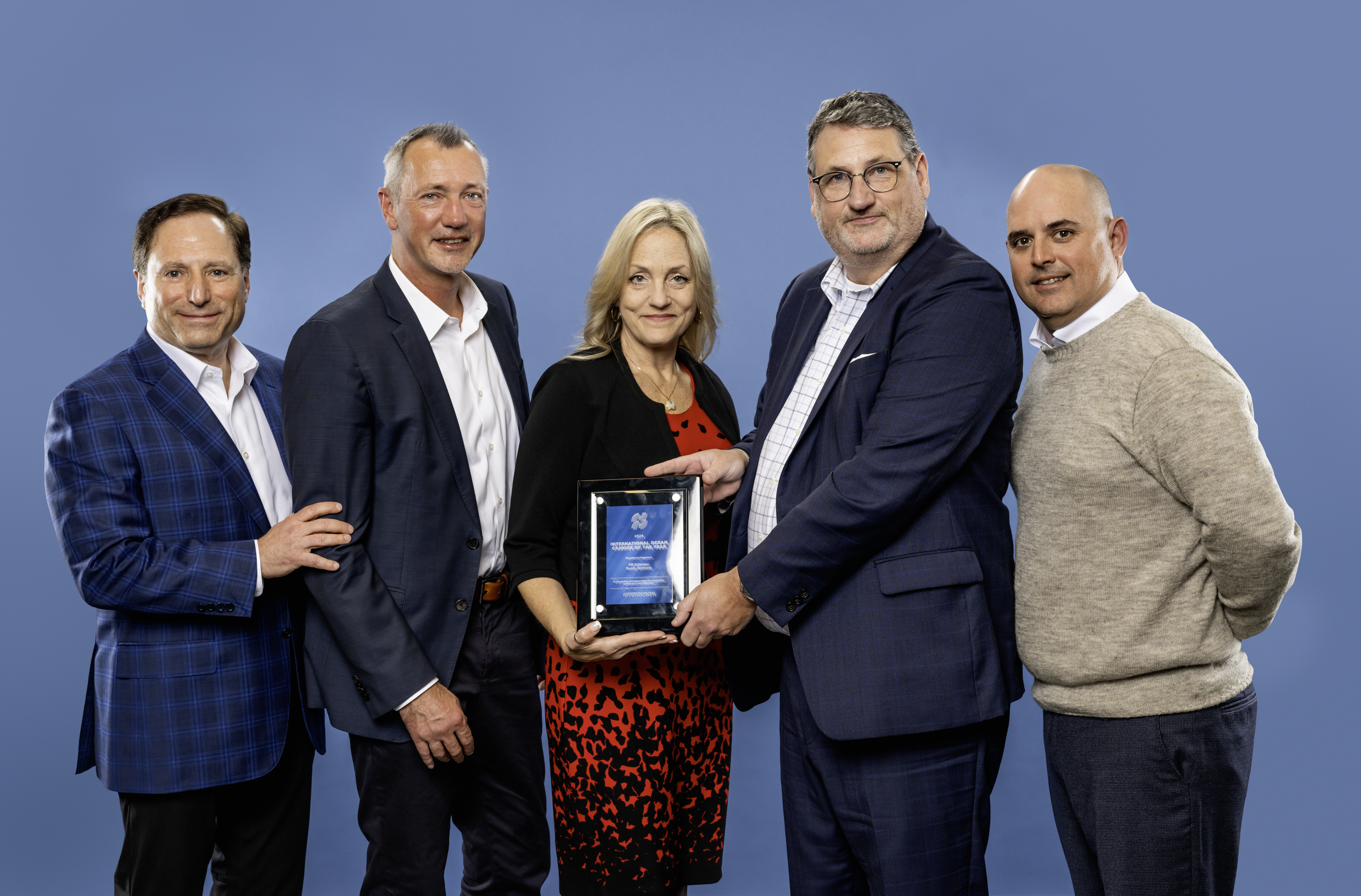 Photo courtesy of Ferguson : DB Schenker – (from left to right) – Michael Jacobs, SVP of Supply Chain Ferguson; Steven DeBrabander, Director Corporate Accounts; Cassandra Stoffle, Operational Key Account Manager (holding the award); Peter Nordstrom - Executive Vice President (holding the award); David Simons, VP of Global Logistics Ferguson.