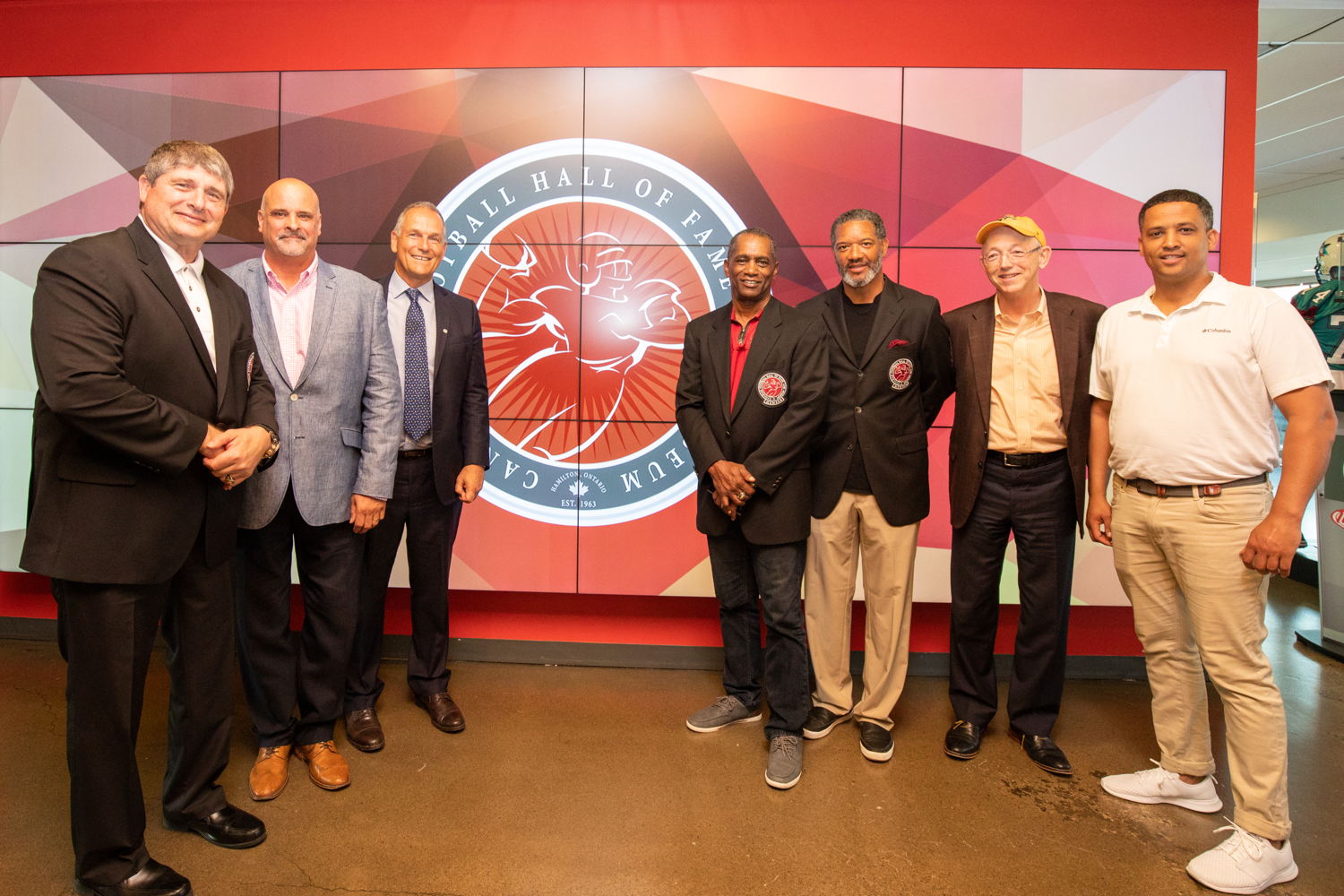 Left to Right: Dan Ferrone, Mark DeNobile, Jim Lawson, Less Browne, Damon Allen, Bob Young and Hamilton City Councillor Matthew Green. Photo Credit: Kevin Sousa/CFL