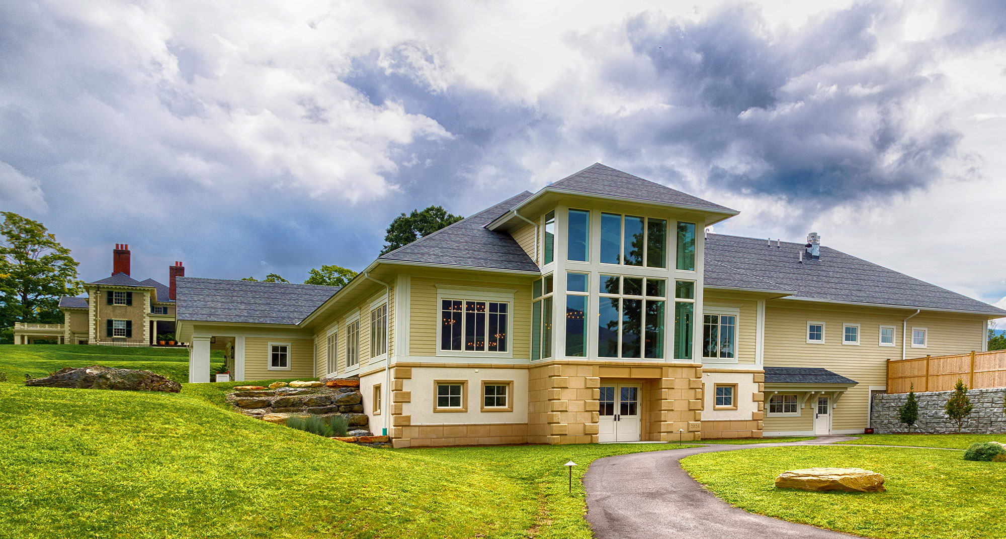 Designed by noted architect Ramsey Gourd, Lincoln Hall carefully reflects the architecture of Hildene, on the rise behind it.