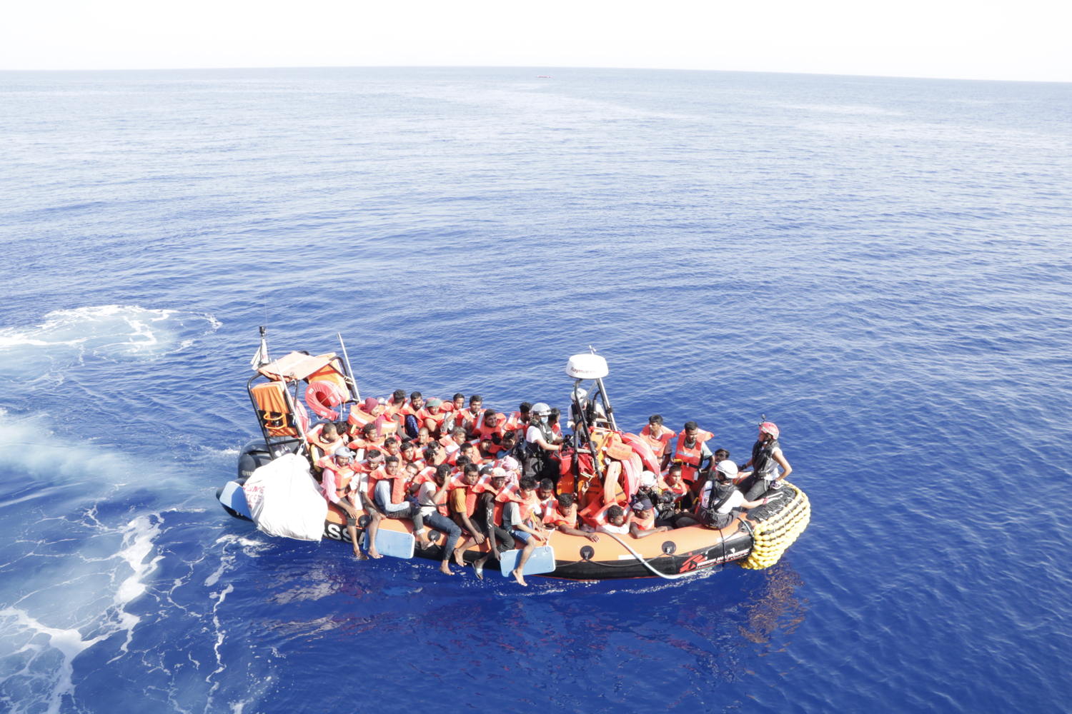 Copyright: Rahul Dhankani/MSF Countries: Mediterranean Sea Date taken / Date Recorded: 27 July, 2022 Caption / Description: On Wednesday 27 July, the MSF search and rescue team spotted from the bridge another wooden boat in distress. 232 people, including 19 minors, have been rescued and have joined the rest of the survivors, bringing the total number of people on board of the Geo Barents to 596.