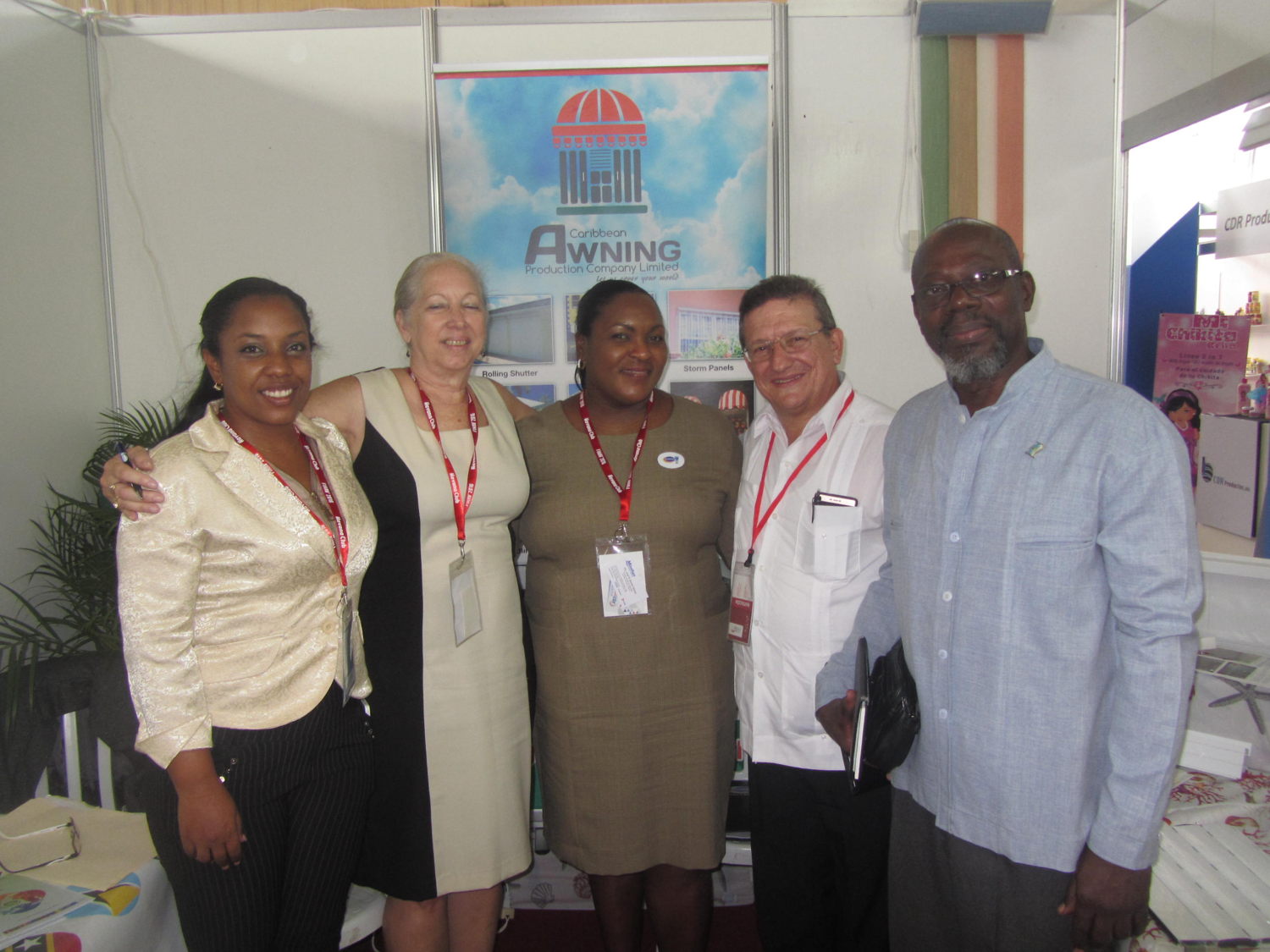 (L to R): Translator Yanisber Reinosa Perez, Paula Calderon from Caribbean Awnings, Cathy Charles  from Harris Paints, Ing. Jose R. Daniel Alonso, Director General of Development of the Cuban Ministry of Tourism and His Excellency, Ambassador Dr. Charles Isaac, Saint Lucia’s Ambassador to Cuba. 
