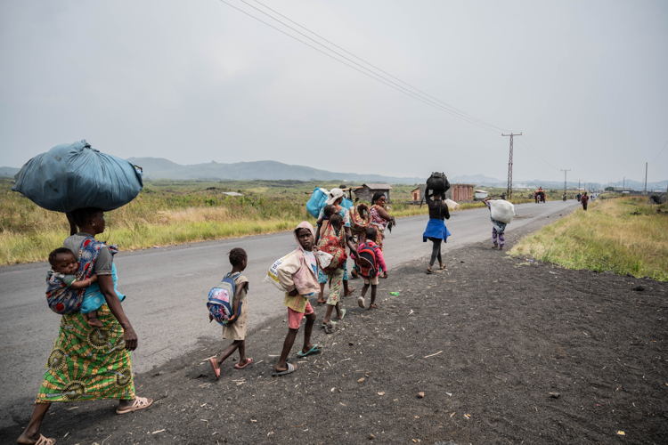 People living in camps, like Nzulo camp, are fleeing to Goma as fightings take place some kilometers away. Copyright: Moses Sawasawa