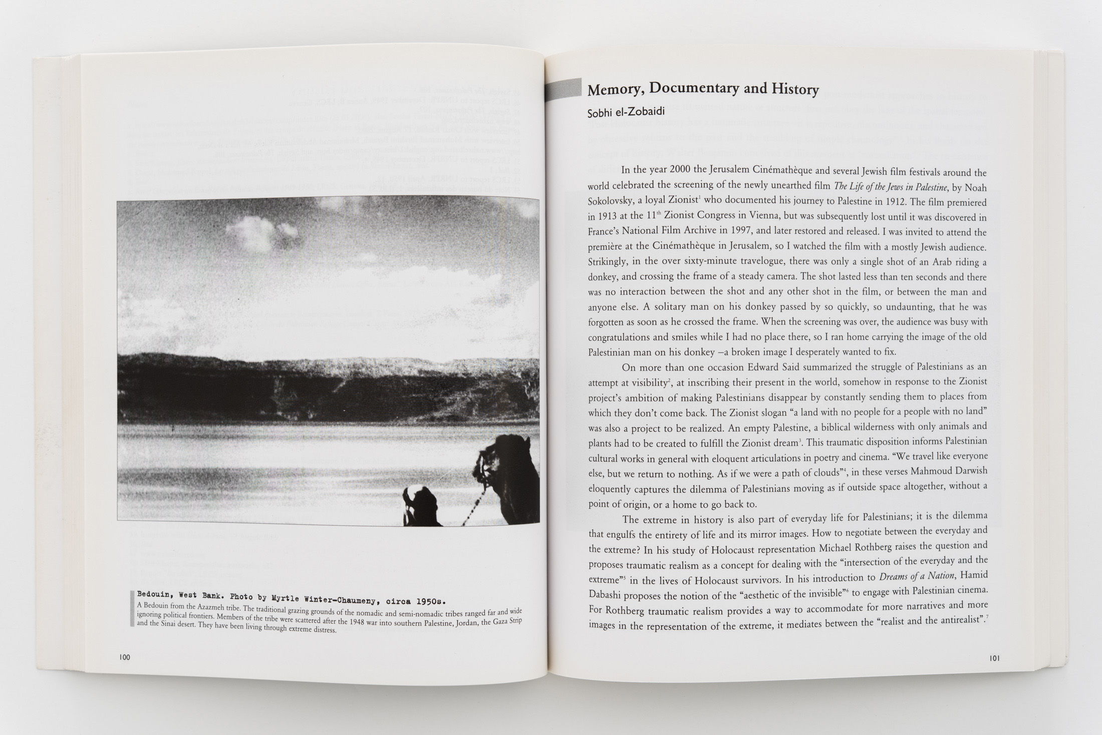 Spread from "I would have smiled: Photographing the Palestinian Refugee Experience" (2009), showing Sobhi el-Zobaidi's essay, "Memory, Documentary and History." Photo: Mahmoud Merjan. 