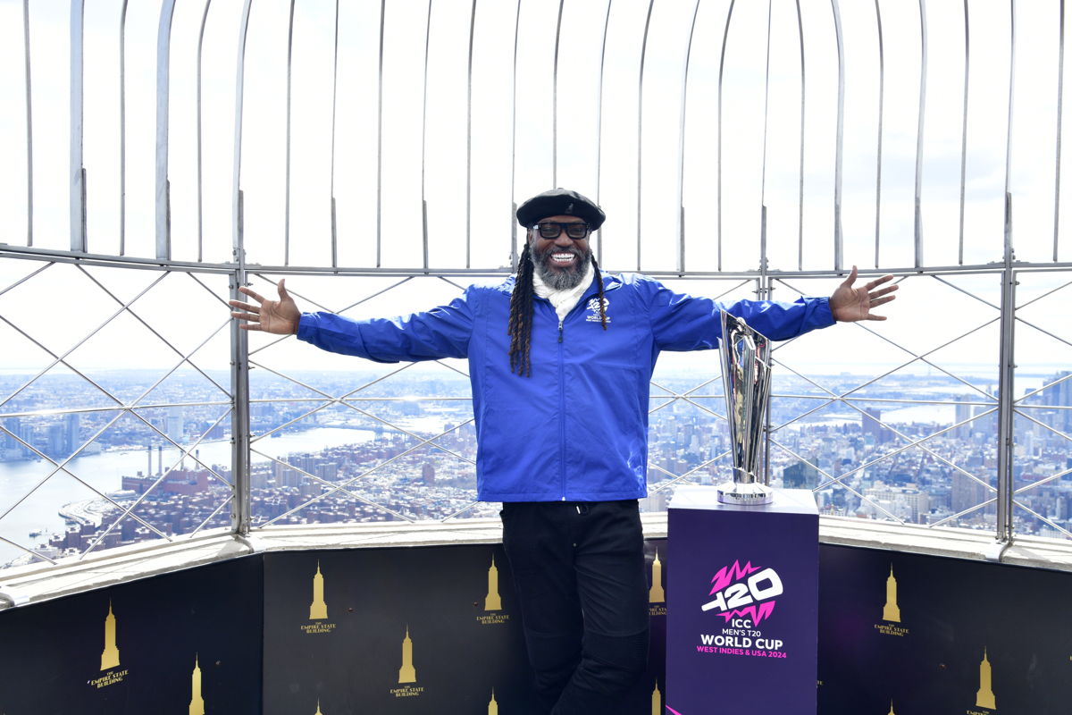 Chris Gayle at the Empire State Building in New York with the ICC Men's T20 World Cup trophy
