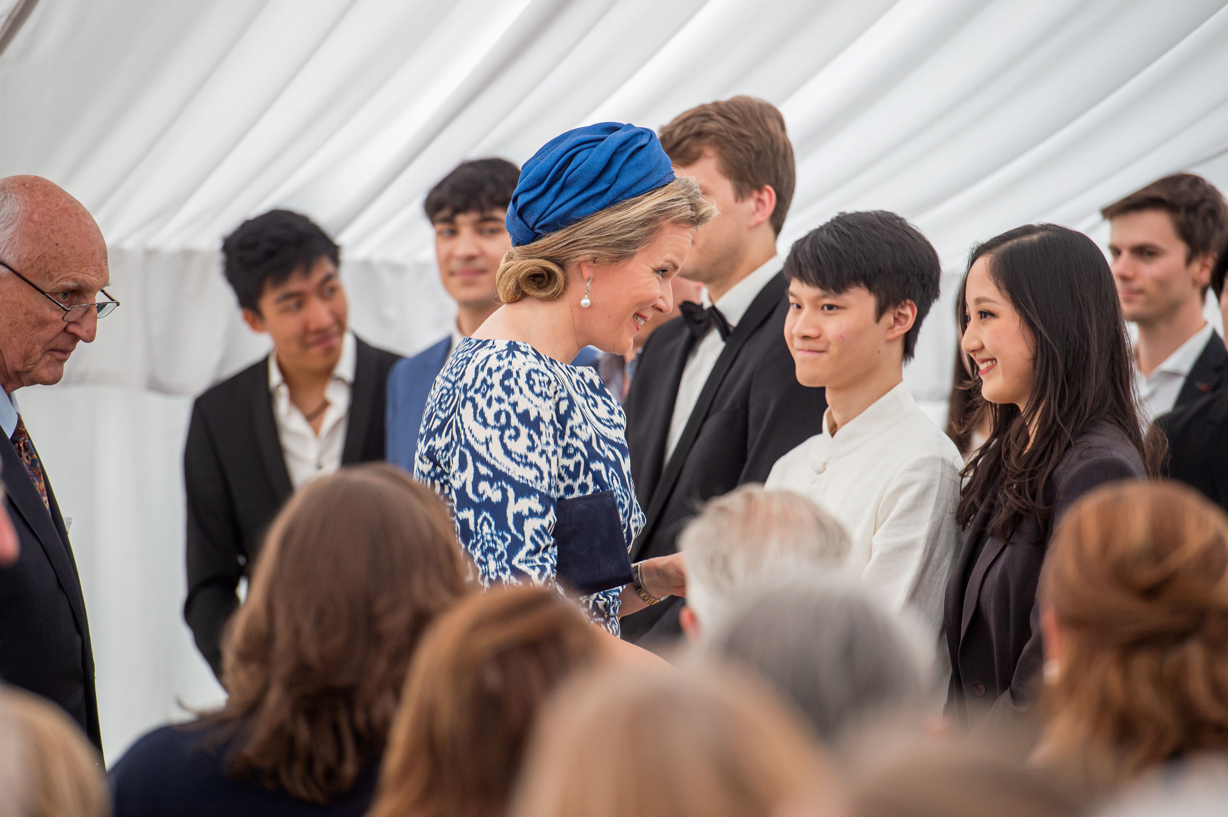 Queen Mathilde with laureates of the Queen Elisabeth Competition for Cello in 2022