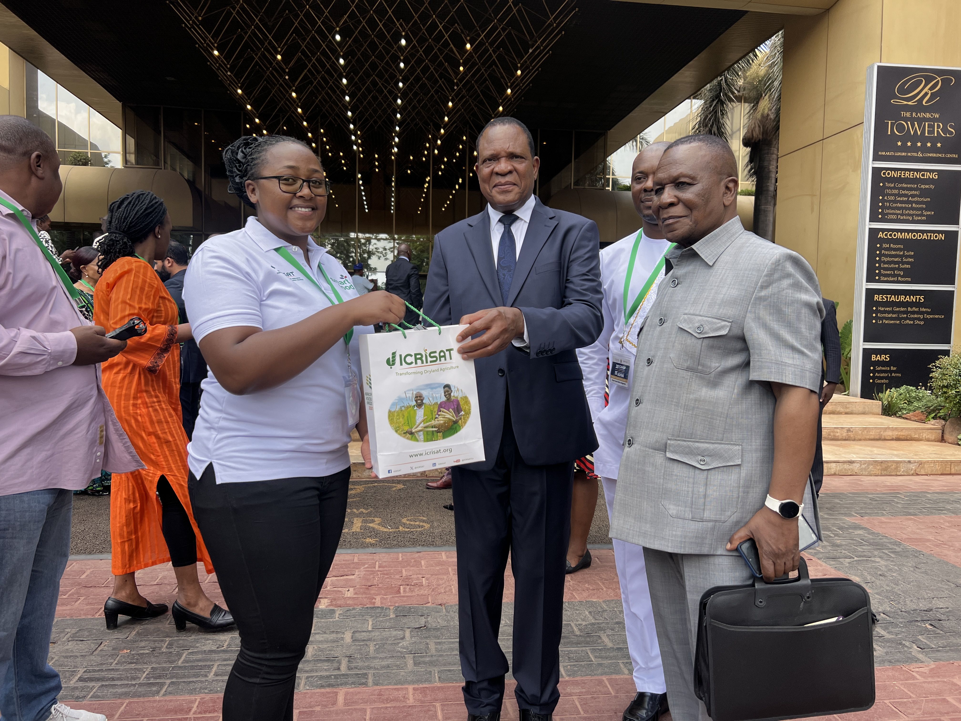 Honorable Dr Anxious Masuka, Minister Lands, Agriculture, Fisheries, Water and Rural Development receives a Smart Food package at the launch.