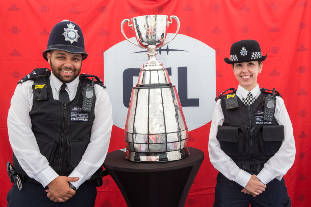 The Grey Cup with Metropolitan Police. Photo Credit: Jim Ross/CFL The Grey Cup with Metropolitan Police. Photo Credit: Jim Ross/CFL
