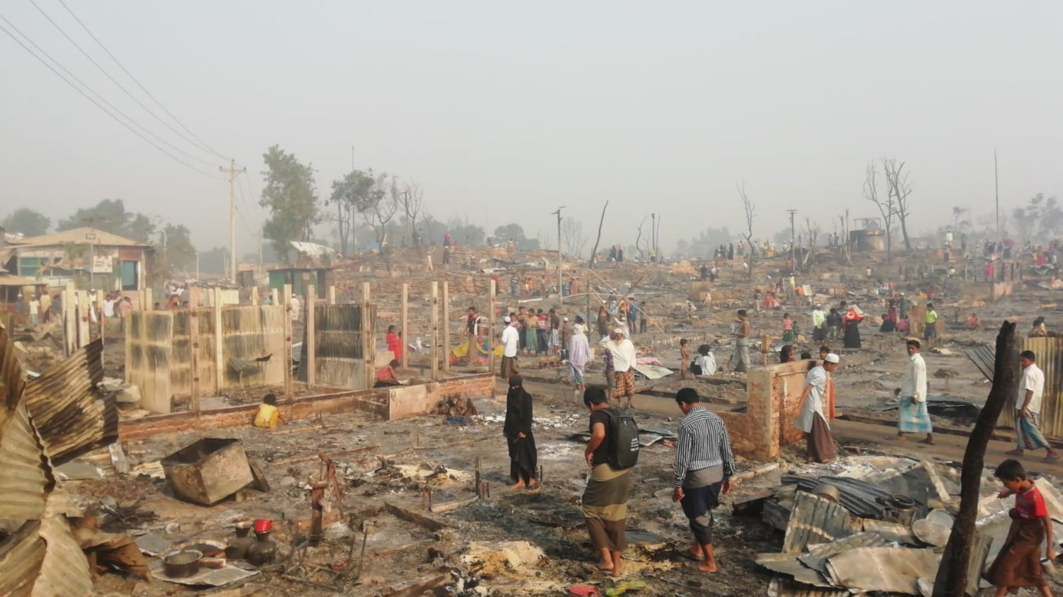 People are looking at their destroyed house / belongings in camp 9 area, one of the most affected by recent fire incident in Rohingya refugee camps.
Picture Lucie Moreau / MSF