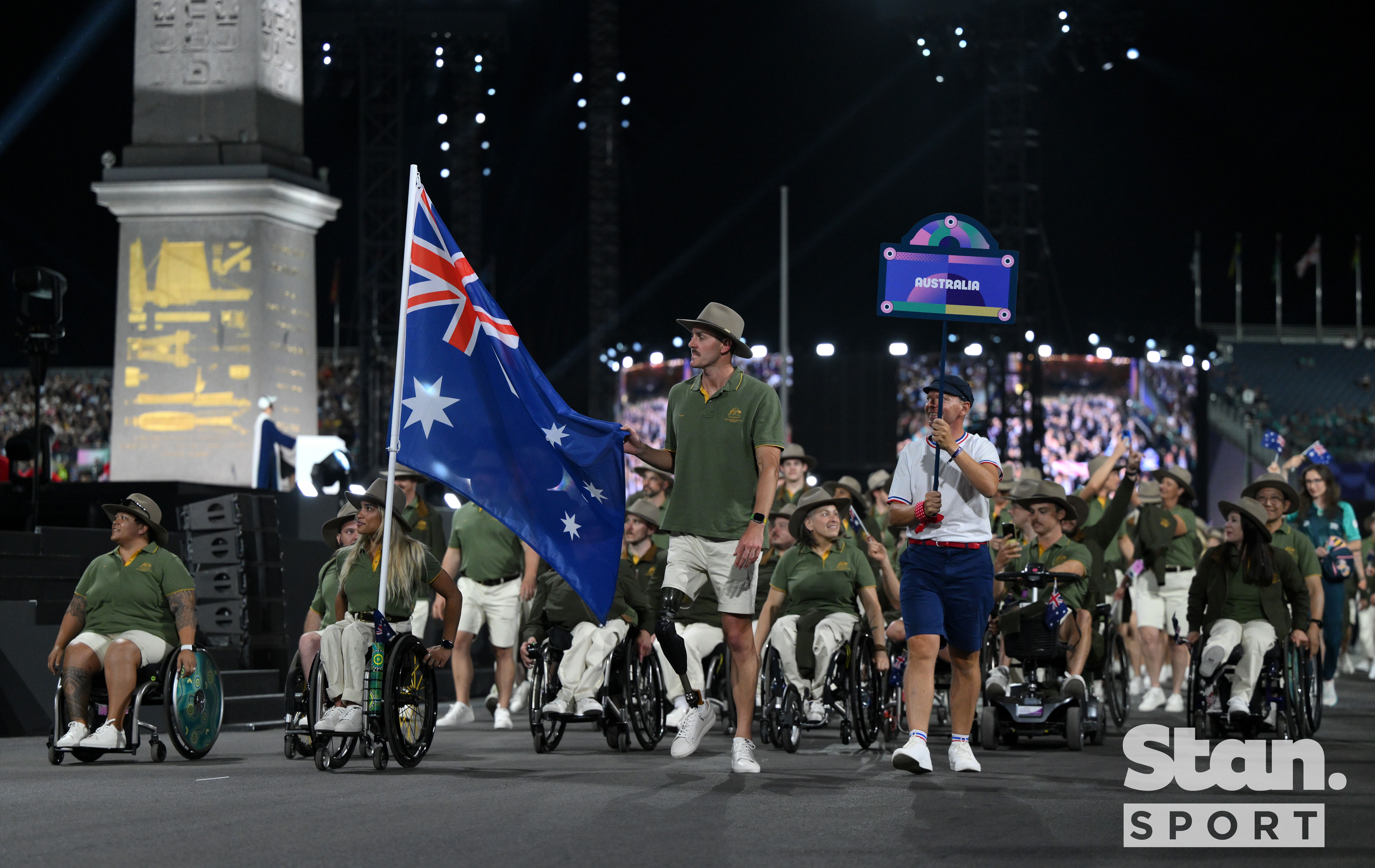 Team Australia at the Opening Ceremony, led by Madison de Rozario and Brenden Hall