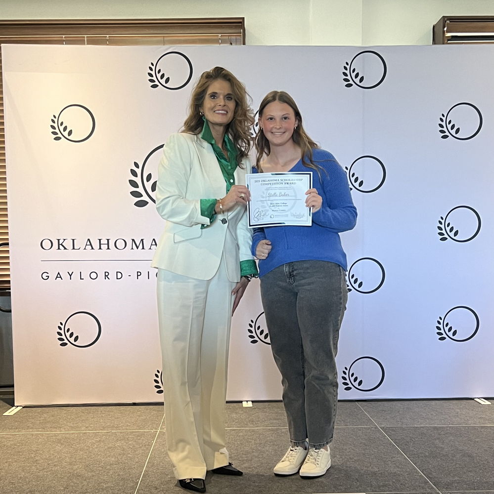OHOF President & CEO Shannon L. Rich presenting scholarship to Stella Baker