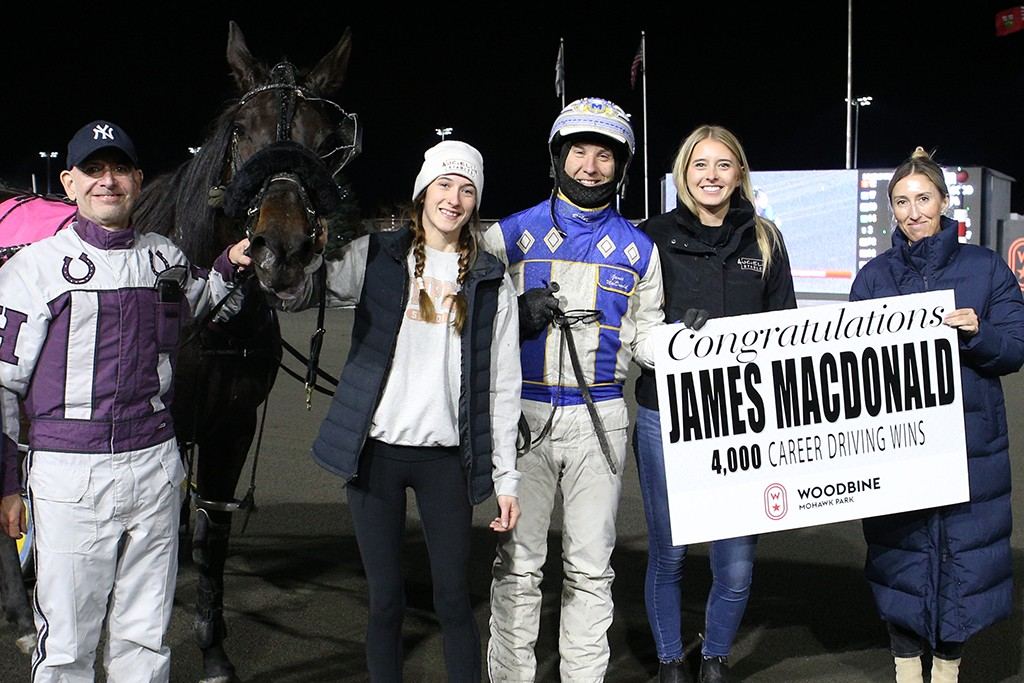 James MacDonald celebrates his 4,000th career driving victory. (New Image Media)