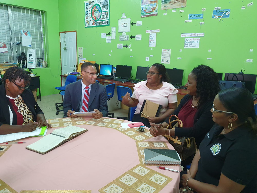 The education delegation of Saint Lucia engages discussion with USAID Regional representative Mr. White