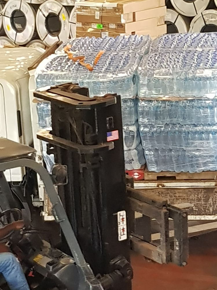 Much needed water leaving from Dominica thanks to Brice and Co.
