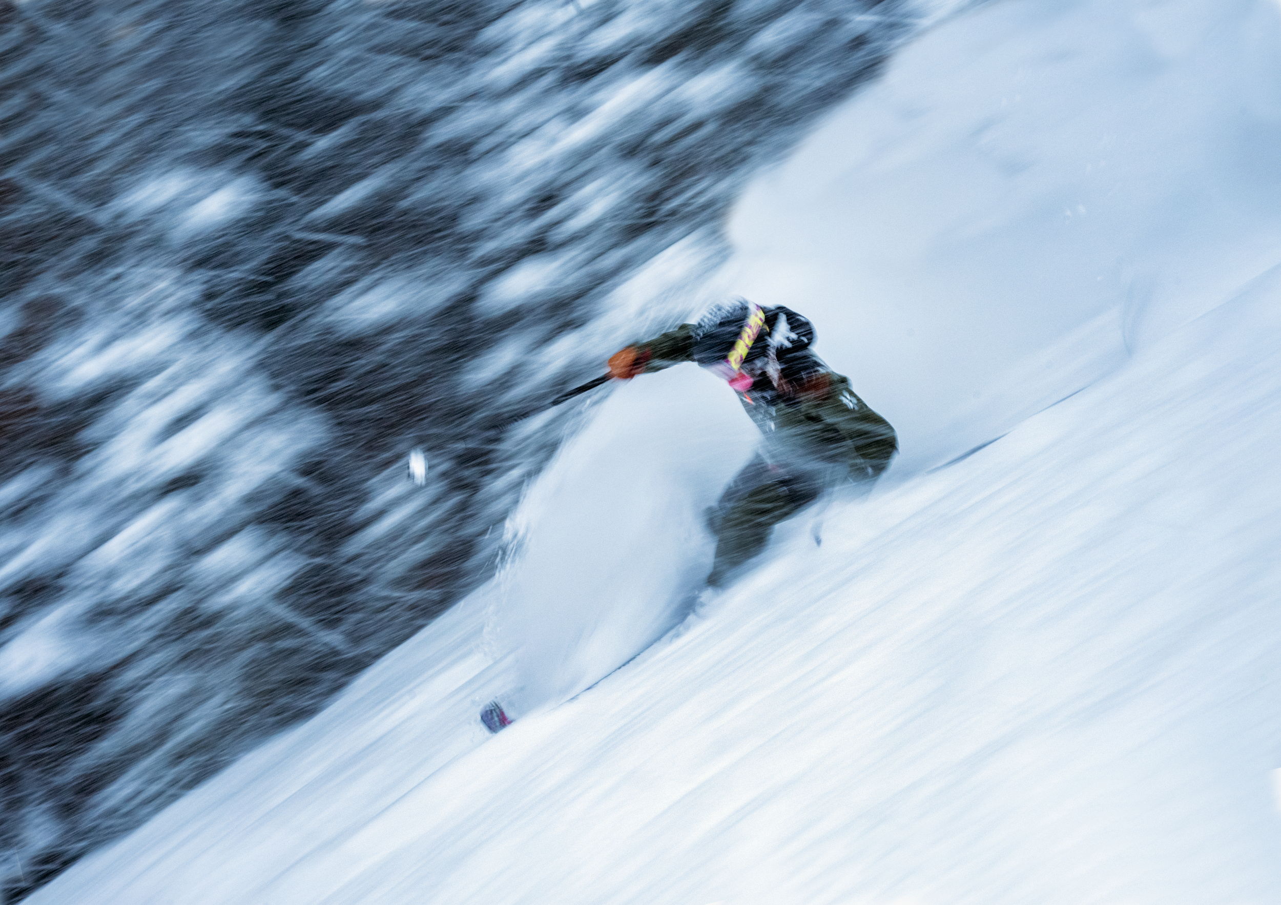 A skier carves through 17 inches of fresh powder at Telluride Ski Resort