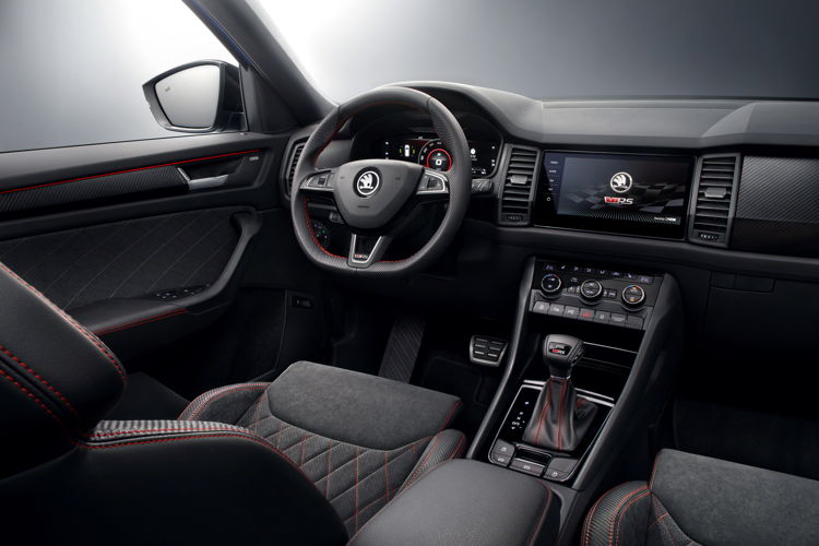 The multifunction sports steering wheel and armrests also feature red contrast stitching, while the carbon decor elements adds further sporting appeal.