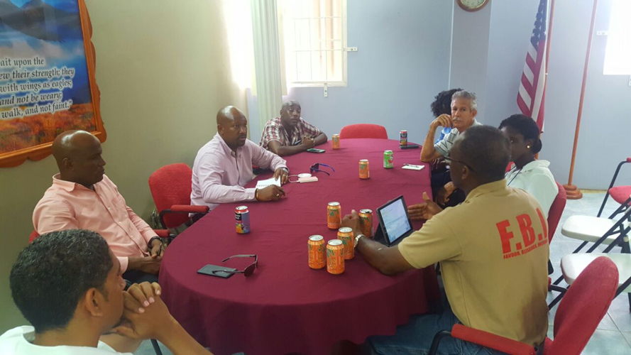 Minister Sabato Caesar in an emergency relief coordination meeting