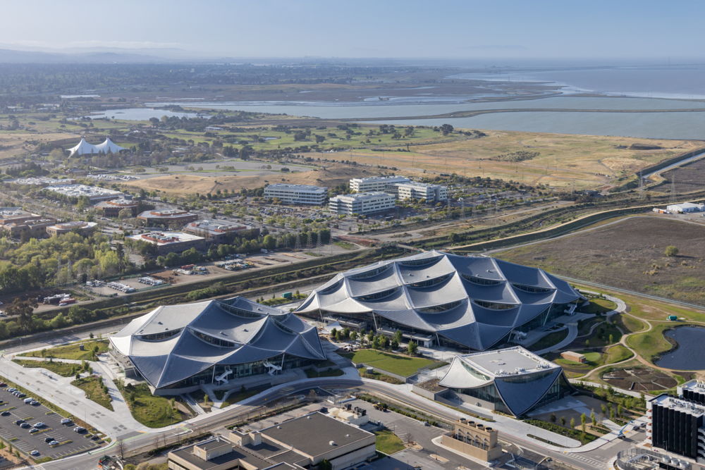 An aerial photo of Bay View in the foreground with parts of Google’s Mountain View campus in the distance as well as the San Francisco Bay. (Photo: Iwan Baan)