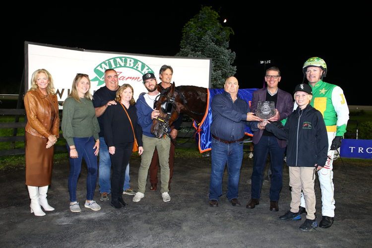 Connections of Captains Quarters in the winner's circle for the Metro Pace Final on September 23, 2023 at Woodbine Mohawk Park (New Image Media)