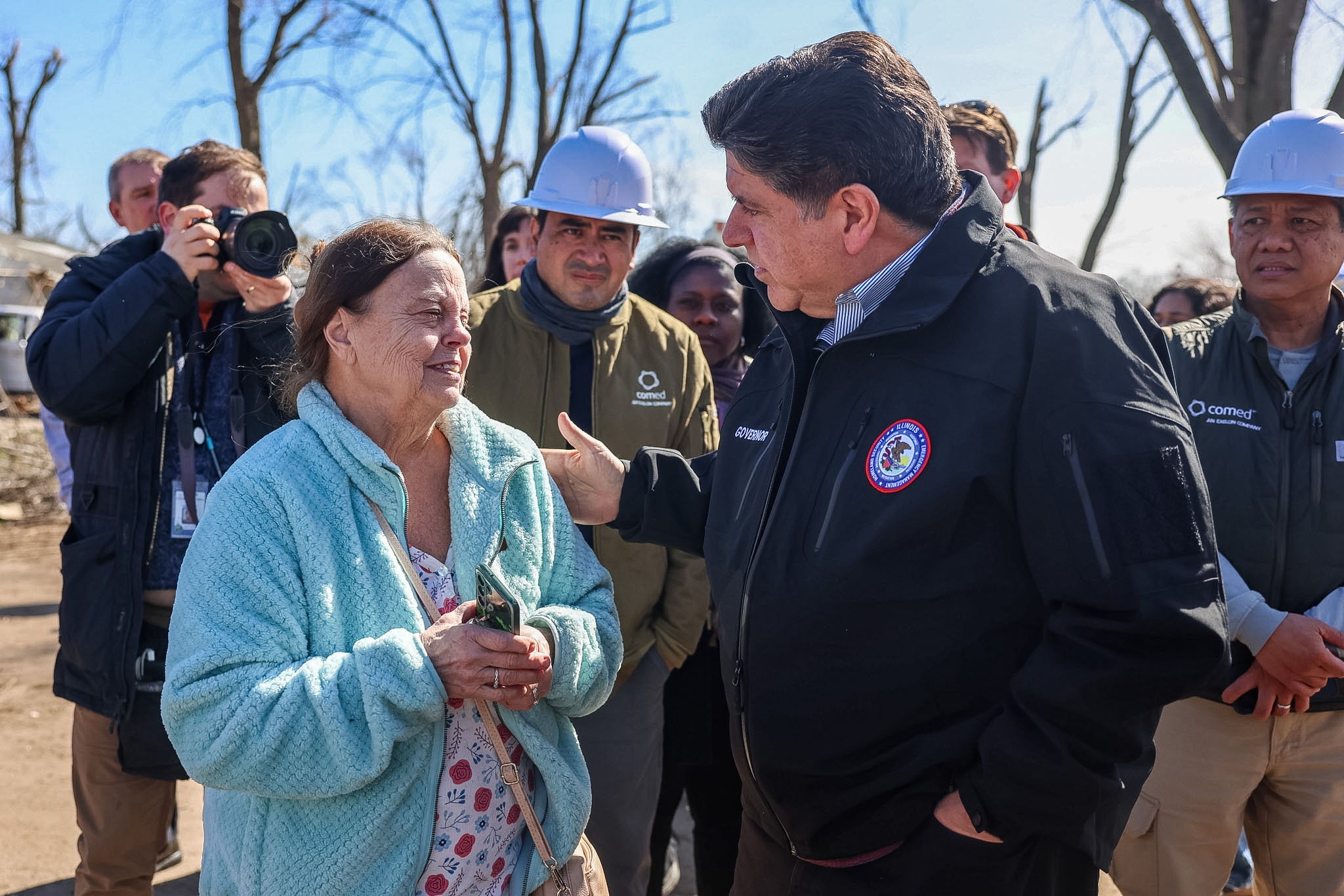 Governor Pritzker meets with a local resident of Kankakee County while visiting the neighborhoods impacted by Tuesday's storms.
