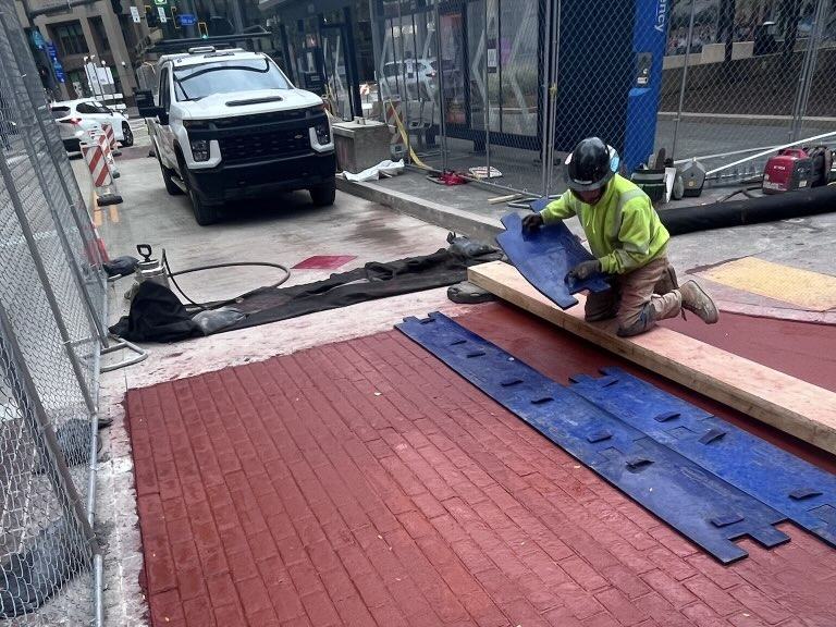 New stamped concrete crosswalk installed at Fifth Avenue and Market Street