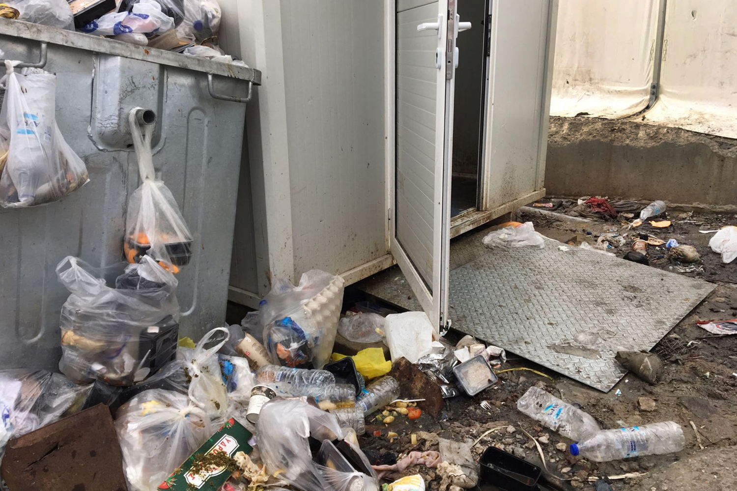 Entrance of one of the toilet containers in Moria camp. Credit: MSF