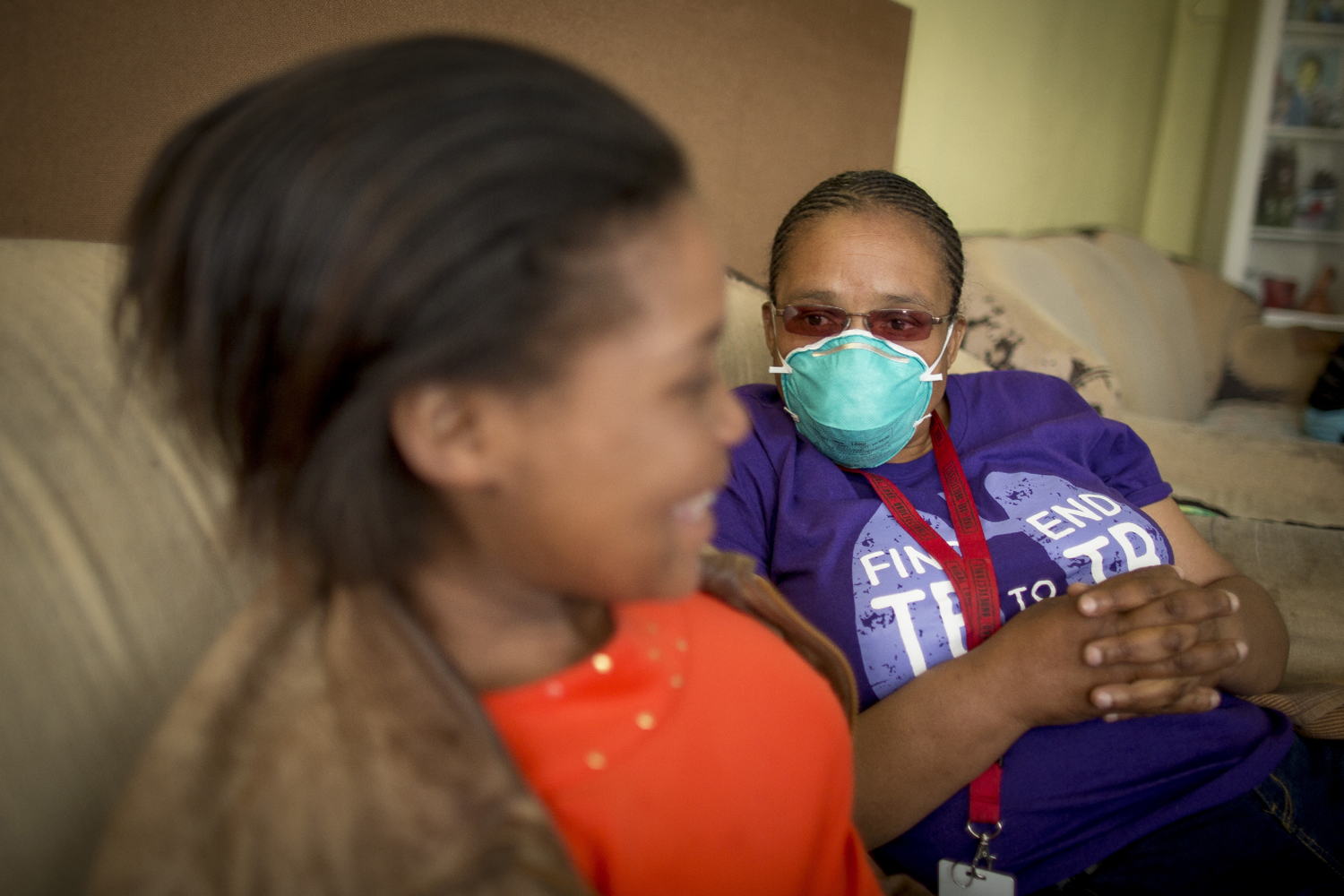 Sinethemba with her MSF counsellor, Xoliswa, at her home in Khayelitsha, Western Cape.

Sinethemba, 16 years, lives with her grandmother, Vuyisiwa Madubela, and four other family members in a two-bedroomed home in Zone C29, Khayelitsha, Western Cape, South Africa.

Her grandmother’s determination and love, combined with receiving a six-month trial of one the newest DR-TB drugs on the market likely saved her life this year.  Photographer: Sydelle WIllow Smith / Médecins Sans Frontières