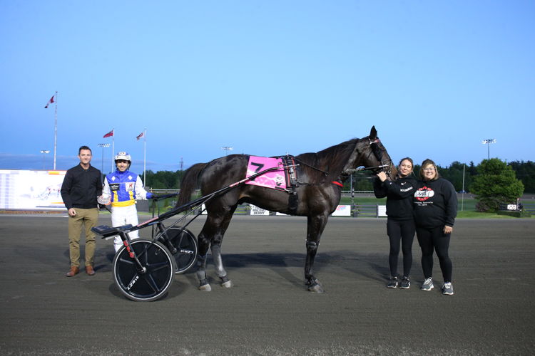 Private Access and connections after winning the first leg of the Graduate Series for four-year-old trotters on May 31, 2025 at Woodbine Mohawk Park (New Image Media)