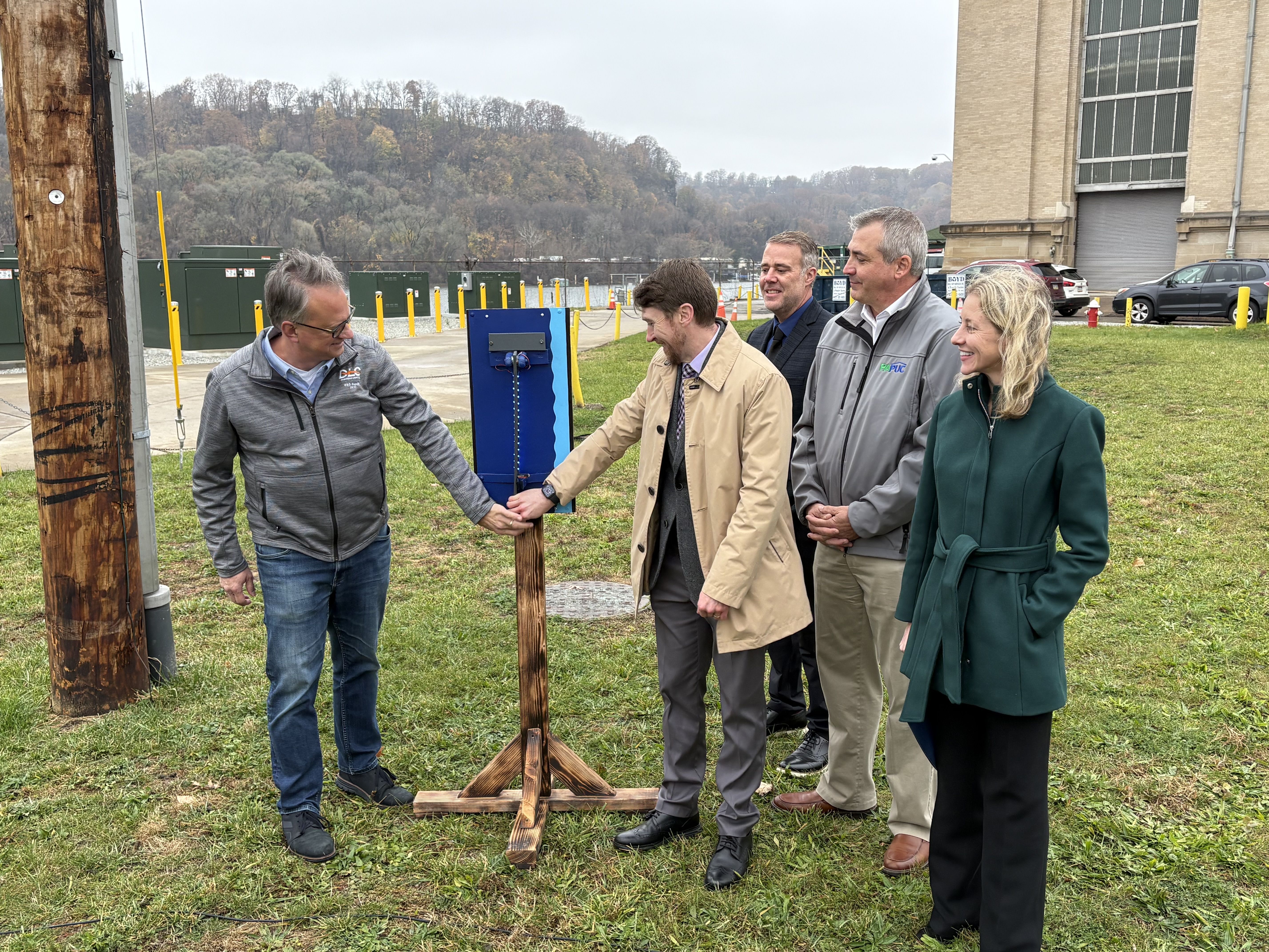 Pittsburgh Water CEO flips the switch with Duquesne Light Company leadership, state regulators and elected officials to celebrate activation of new dual feeds.