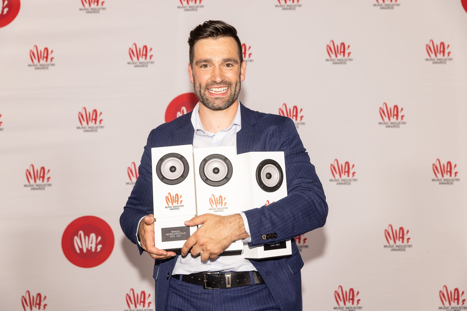 Singer Joris van Rossem aka Metejoor poses with awards won at the 14th edition of the MIA's