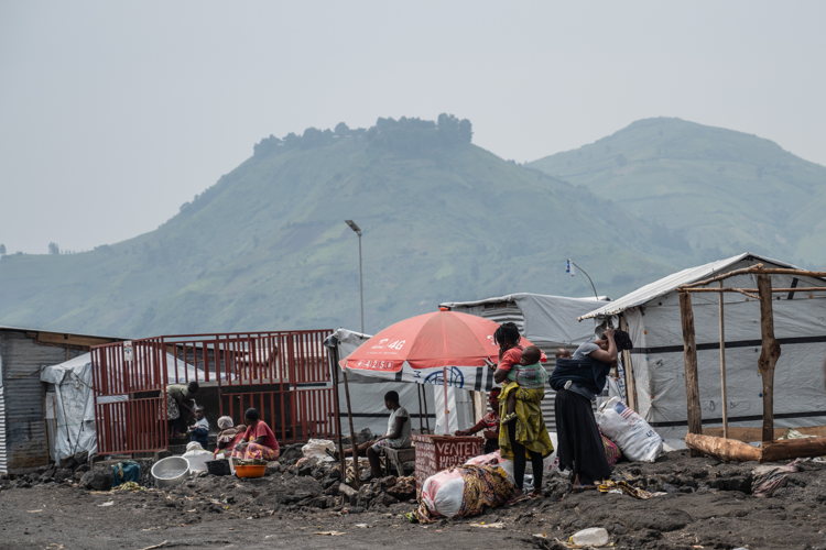 People living in camps, like Nzulo camp, are fleeing to Goma as fightings take place some kilometers away. Copyright: Moses Sawasawa