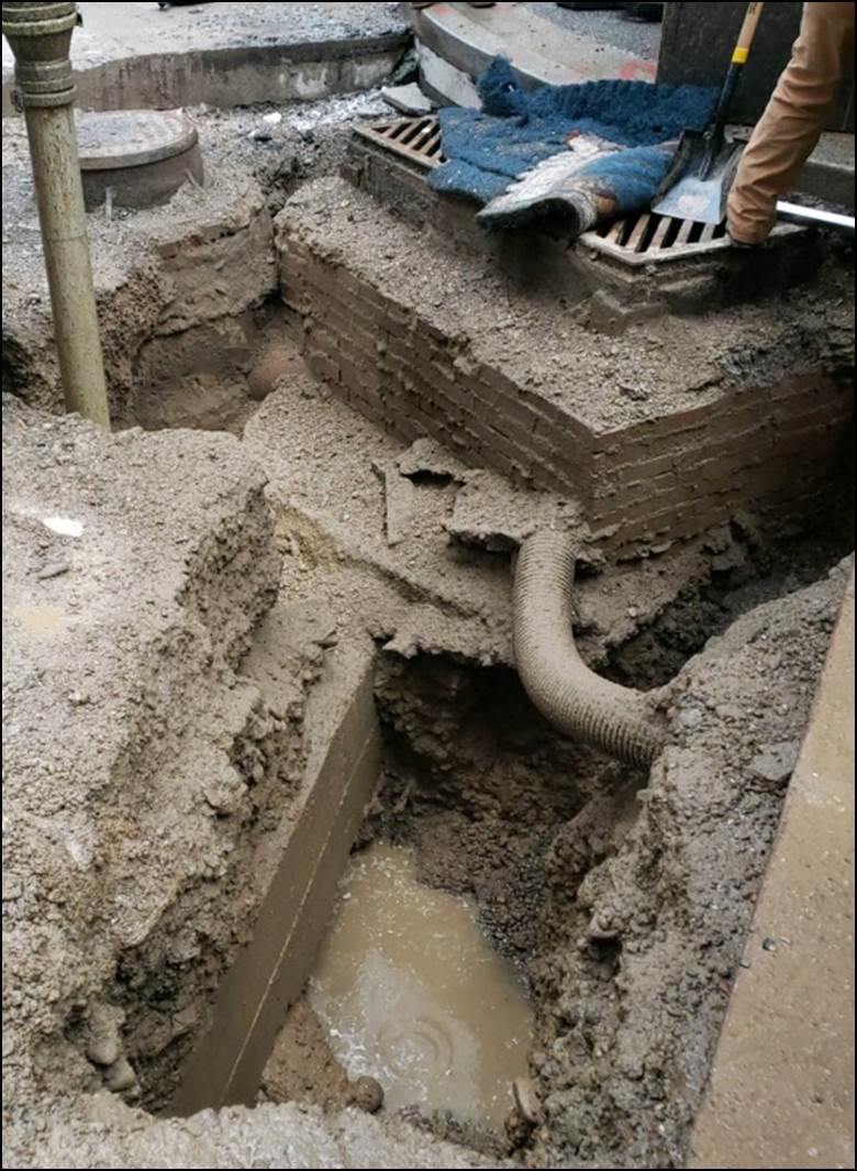 Hydro excavating at Sixth Avenue and Wood Street