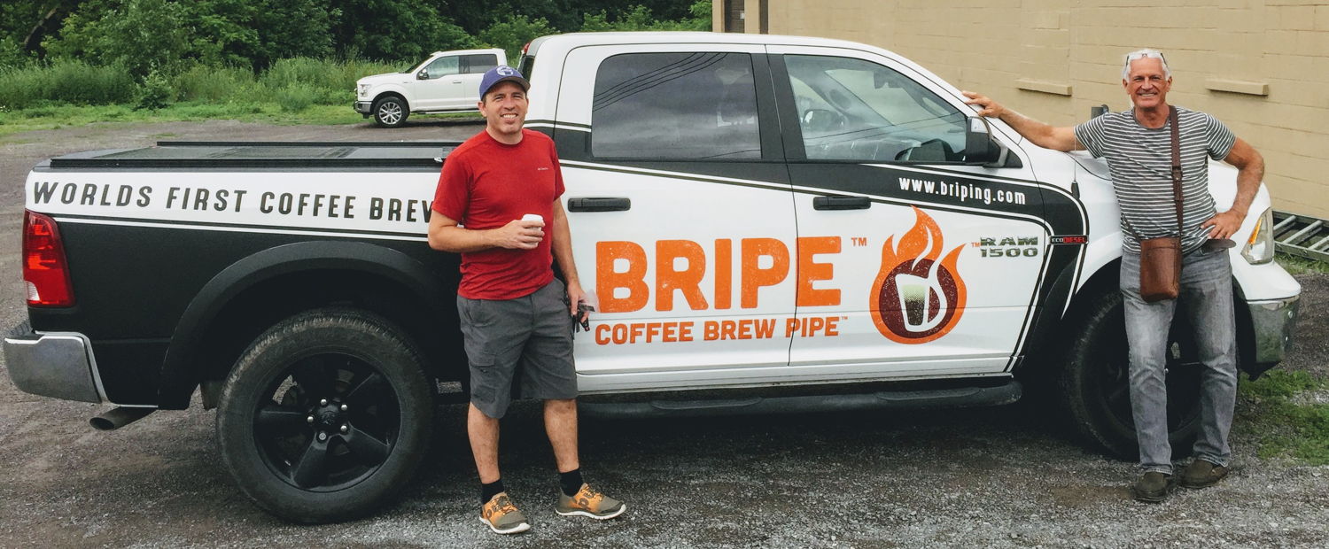 Craig Hall and Tim Panek with "the Bripemobile" that Tim's using to introduce outdoor retailers across North America to the Bripe Coffee Brew Pipe