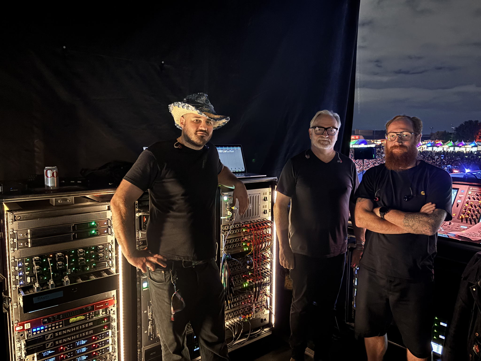 Beveridge and other touring crew members backstage with the two base stations at the top of the left rack.