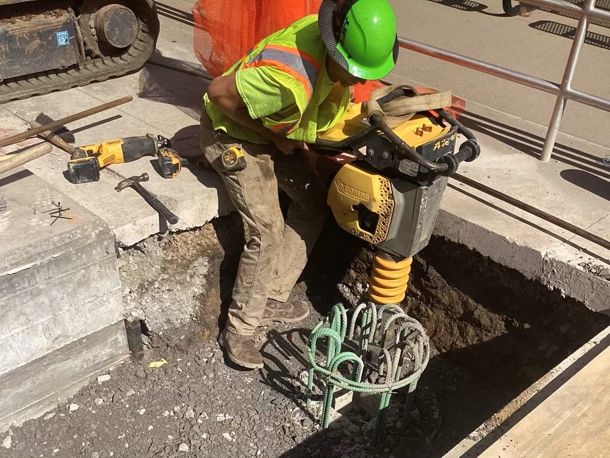 Installing a new foundation for pedestrian lighting at Fifth Avenue and Washington Place Installing a new foundation for pedestrian lighting at Fifth Avenue and Washington Place