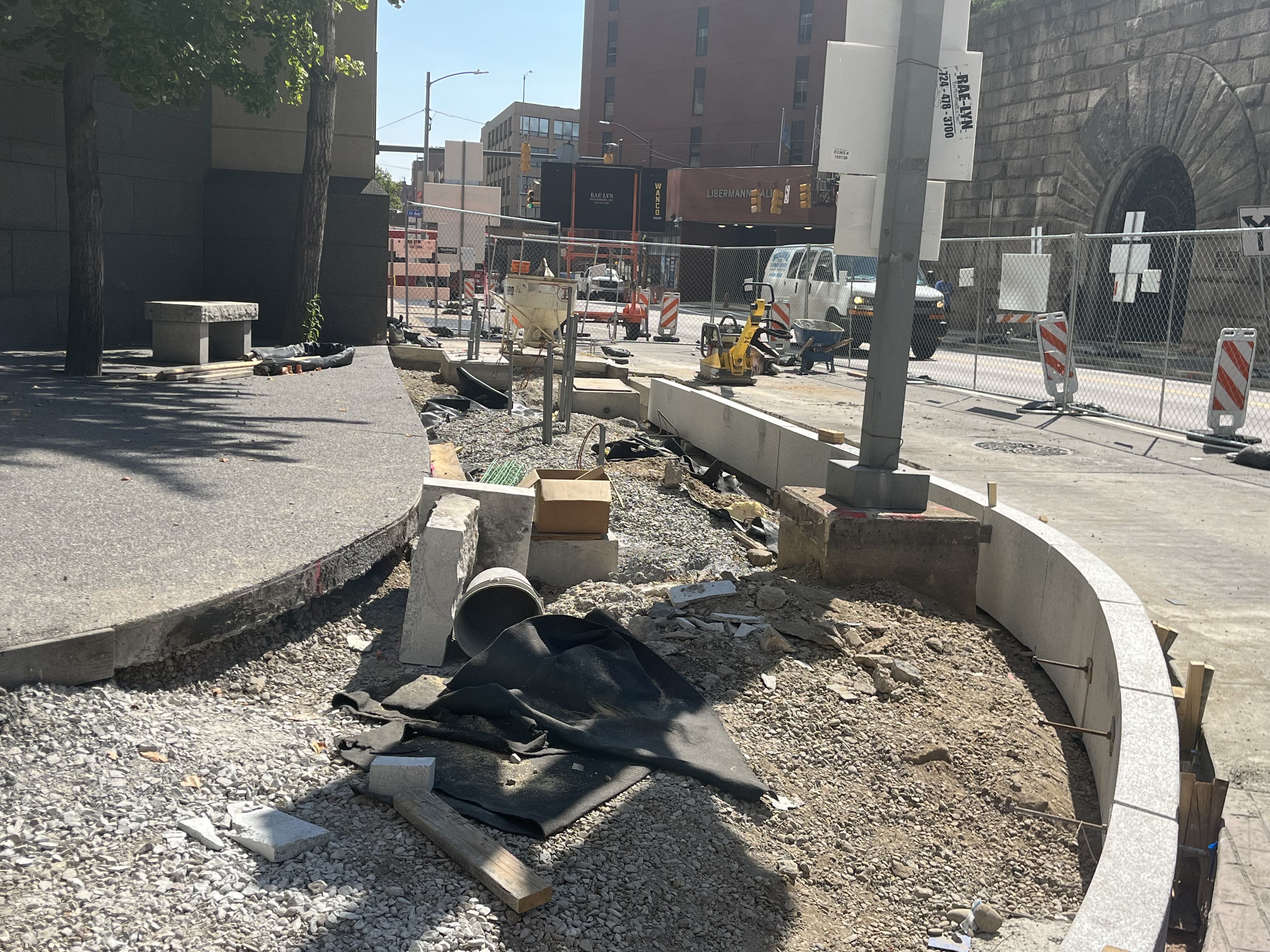 Granite curb installation at Fifth Avenue and Ross Street