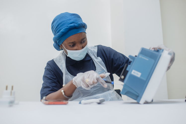 Diouf Badiene Anta Cisse, Biomedical Technician for the Senegal Ministry of Health, works on a simulator in the Medical Capacity Building course.