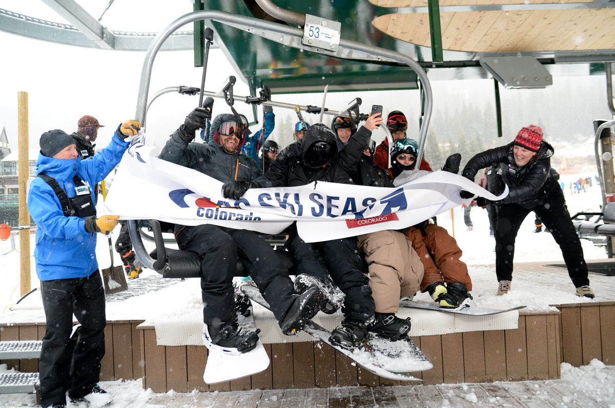 Happy snowboarders grab the first chair of the Colorado Ski Country USA 2022-23 ski season at Arapahoe Basin. Photo by Jack Dempsey for Colorado Ski Country USA