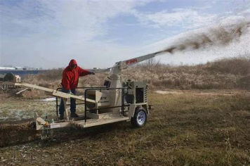 Example of a straw blower in action. Note: this is a stock photograph and was not made on any CNX site.