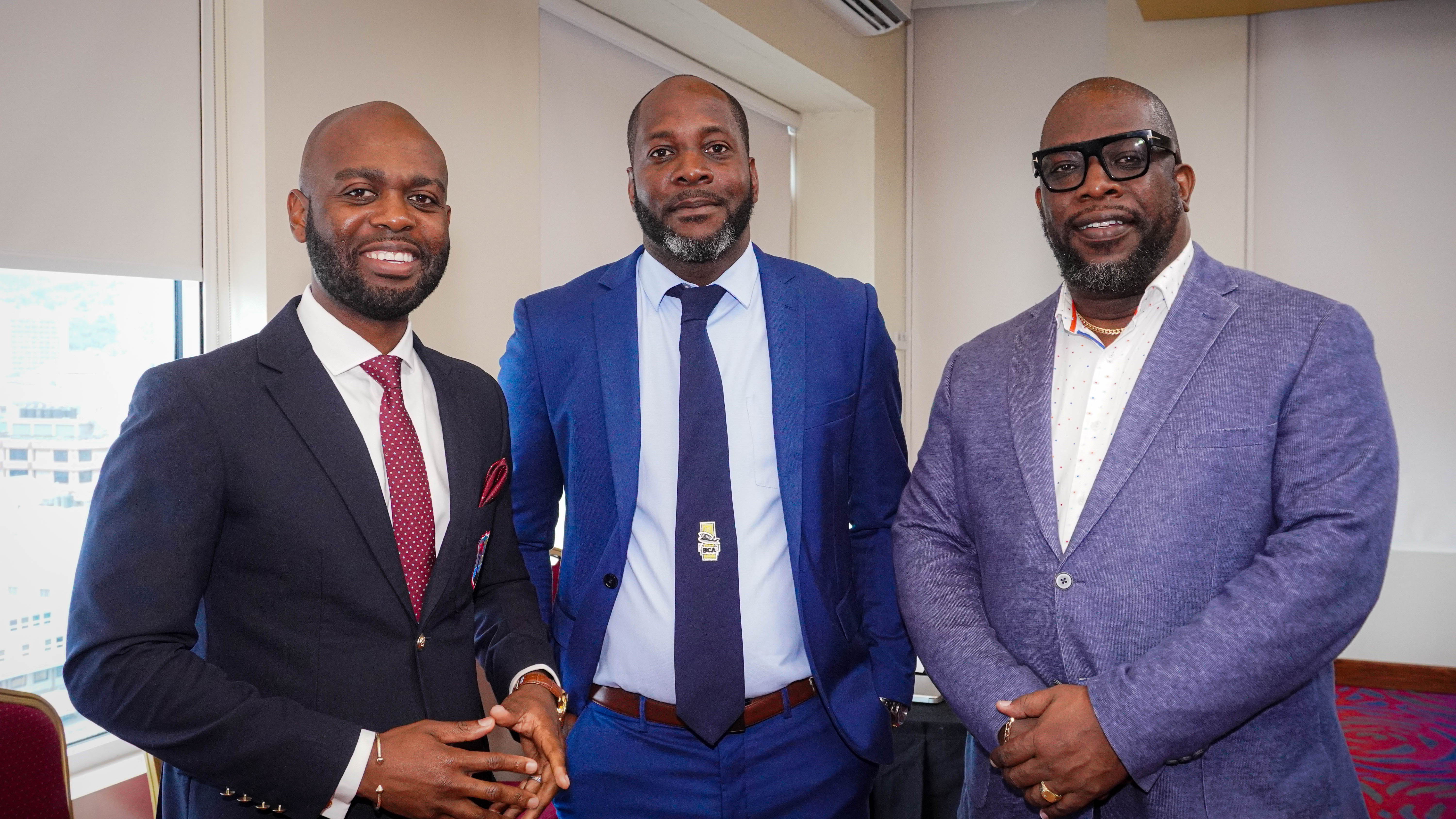 President Dr. Kishore Shallow (left) standing beside Barbados Cricket Association (BCA) representatives Pedro Greaves (centre) and Senator Gregory Nichols (right).