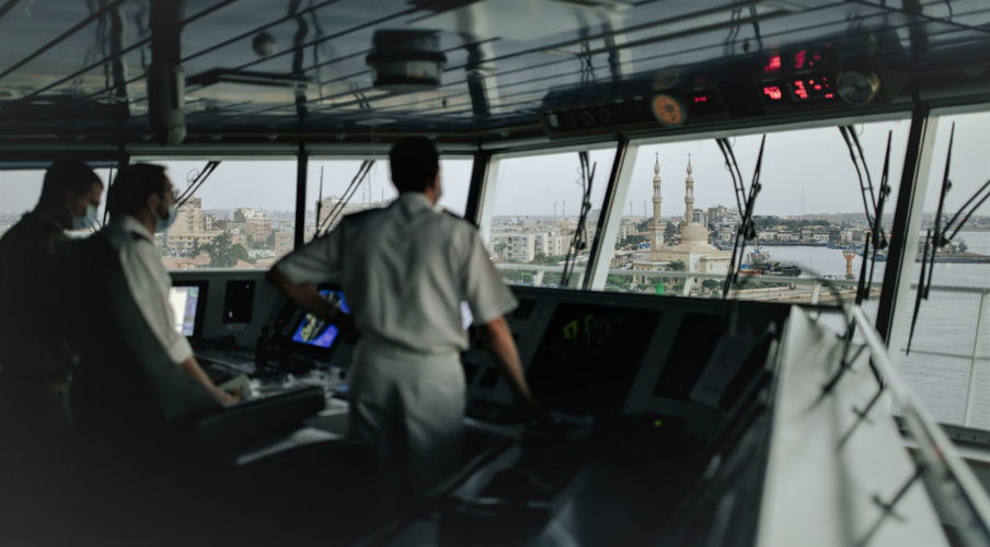 Captain Taylor Perez navigated the Global Mercy (R) through the Suez Canal at no charge to Mercy Ships, thanks to the grace of Egyptian authorities. photo (c) Mercy Ships / Emily Frazier