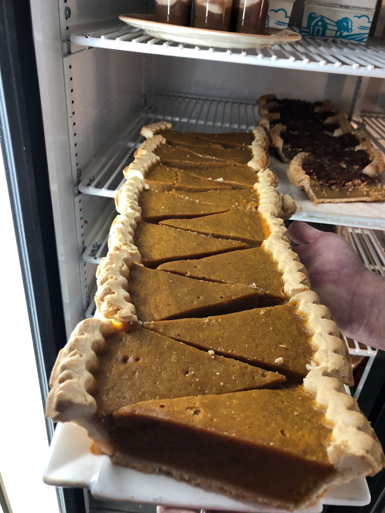 Slices of scrumptious pumpkin pie on a tray before being plated up for Monarch Casino's dessert buffet