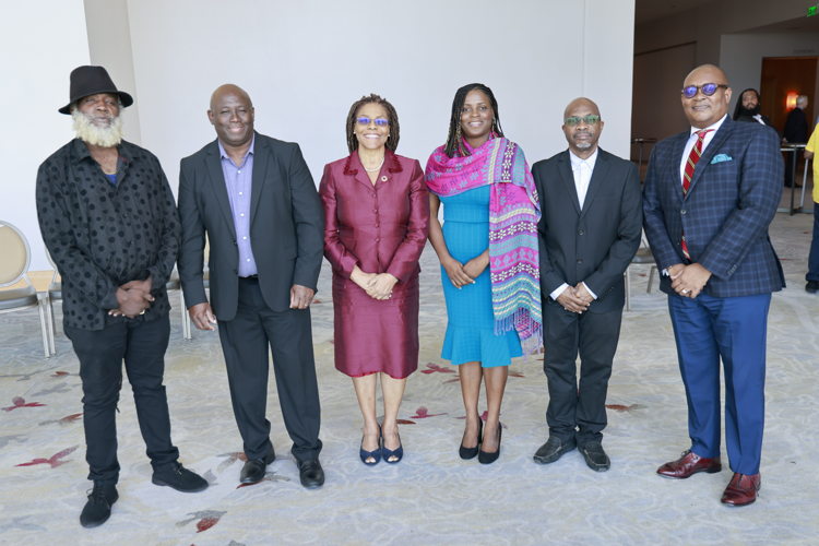 (From Left) Trinidadian singer Dread Wizard, Dr. Martin Baptiste Division Chief, Social Sector Division Caribbean Development Bank, Ms. Marie Hinds, Permanent Secretary (Ag.) in the Trinidad and Tobago Ministry of Planning and Development, Project Manager Data for Decision Making Project,Organisation of Eastern Caribbean States Commission (OECS) Ms. Sherma Beroo, Mr. Edwin St Catherine OECS Commission Project Coordinator for eCPA  