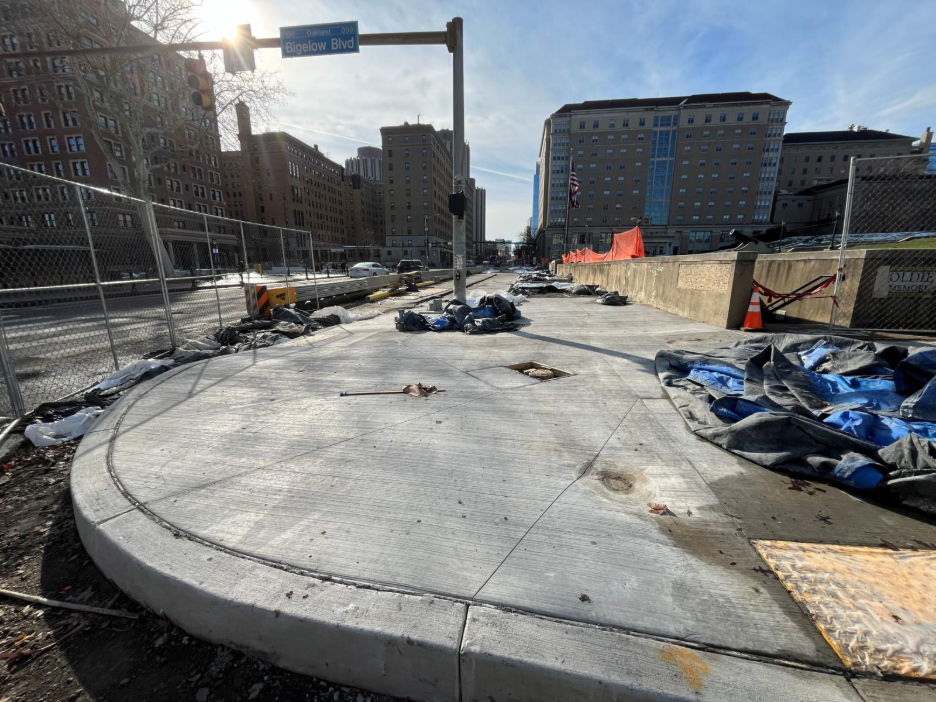 New sidewalk recently poured on Fifth Avenue adjacent to Soldiers and Sailors Memorial New sidewalk recently poured on Fifth Avenue adjacent to Soldiers and Sailors Memorial