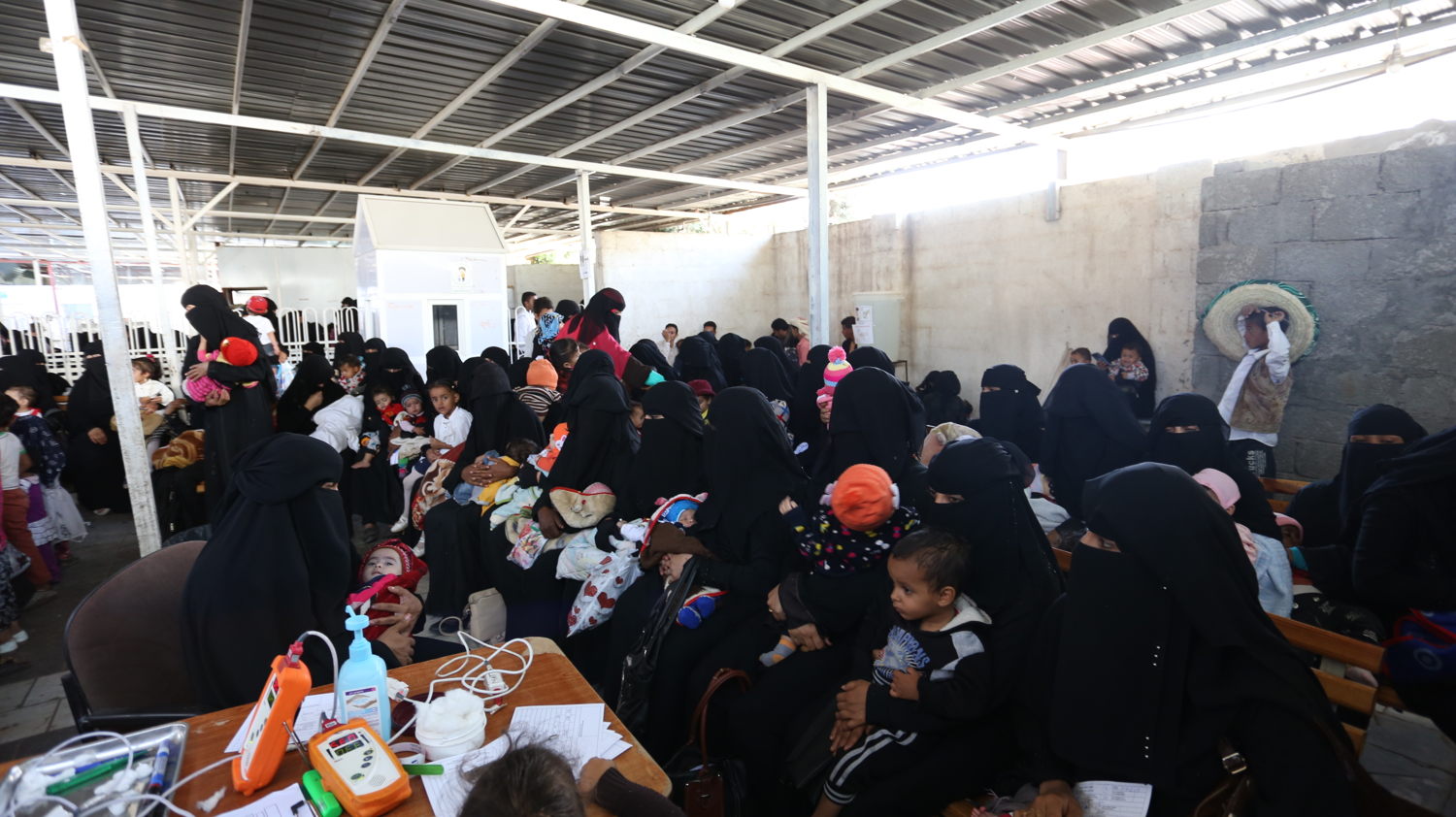 Women and children in the waiting area at MSF's mother and child hospital in Taiz Houban. Copyright: Nuha Mohammed/MSF