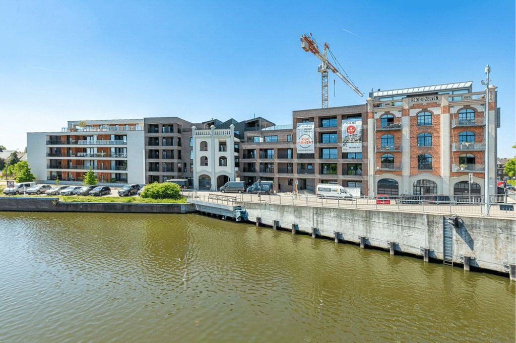 Nieuw woonproject in voormalig tuincentrum Van Gucht klaar en recent aangesloten op tijdelijk warmtestation