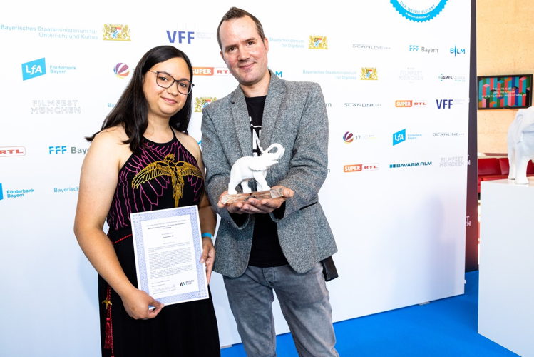 Jay Pfeifer and Daniel Weber accepted the prize on behalf of the team.(both HandyGames producer) 